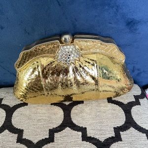Gold clutch - size of hand, hard shell